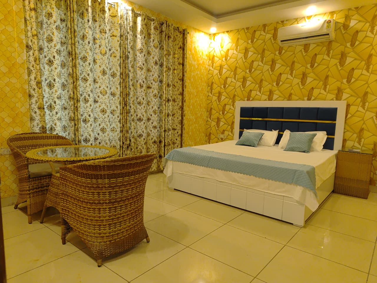 Master bedroom with king-size bed and AC