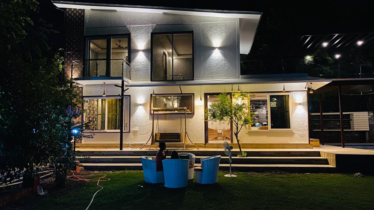 Outdoor evening seating with pendant lights