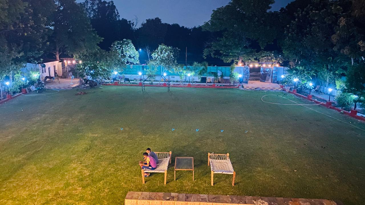Evening on the lawn with traditional charpai
