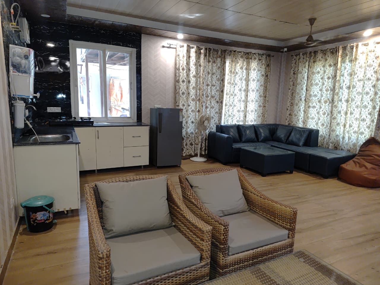 Open plan living with wicker and leather seating